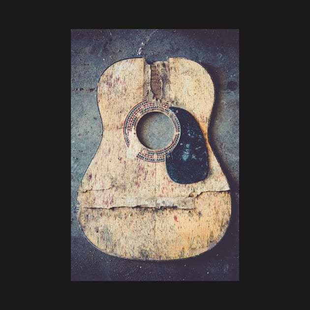 Broken acoustic guitar by Juhku