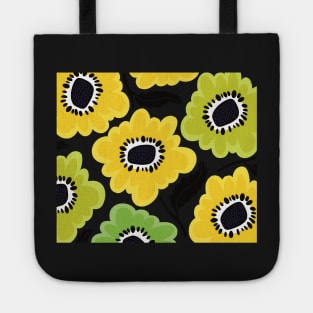 The Sunny flowerpower pattern in 1970-style, orange, black, yellow and white Tote