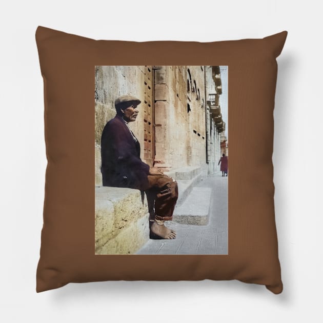 Italy, San Severo. Man Sitting Near a Church, 1944 Pillow by UltraQuirky