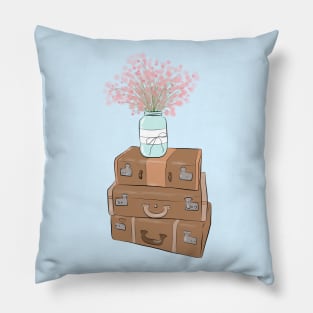 Pile of baggage with a jar with flowers Pillow