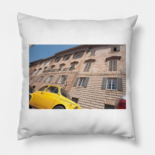 Bright yellow classic Fiat 500 in Italian street. Pillow by brians101