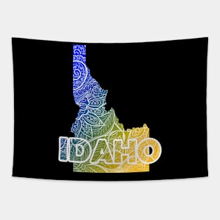 Colorful mandala art map of Idaho with text in blue and yellow Tapestry