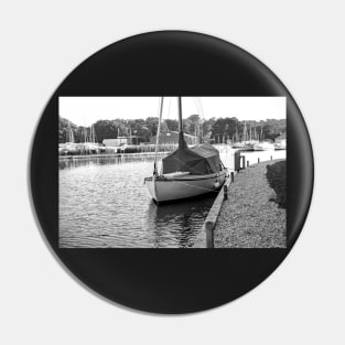 Traditional sailing boat moored up on the River Ant in the Norfolk Broads Pin