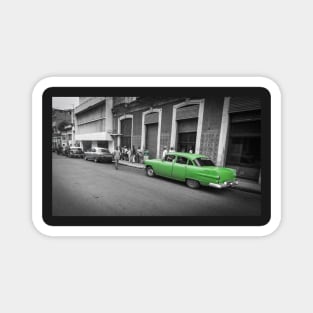 Old American classic Pontiac car on bright green in Havana Magnet