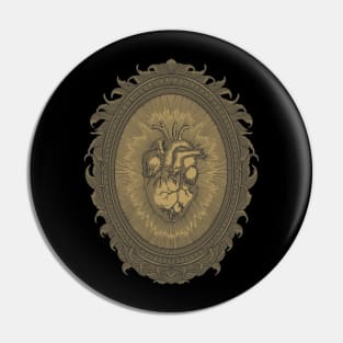 vector illustration of an antique human heart with engraving frame and ornament Pin