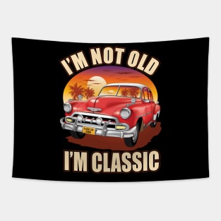 I,m not old I,m classic red classic car on the beach Tapestry