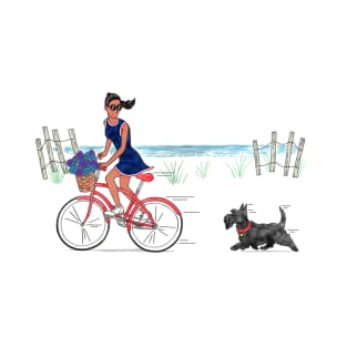 Girl on bike with Scottie dog riding on beach. T-Shirt