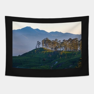 Sunrise over mountains covered with clouds Tapestry