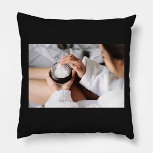 Woman In Bathrobe Using A Cream Pillow