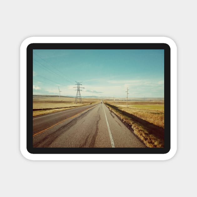 Canadian prairie landscape with a country road near Pincher Creek, Alberta, Canada. Magnet by Nalidsa