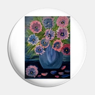 A lovely boutique of abstract metallic flowers in a blue vase . Pin