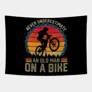 Never Underestimate an Old Man on a Bike Tapestry