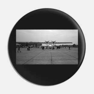 Man walking across consolidated PBY-5A Catalina Pin