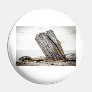 An old boat bollard in Vik's harbor Pin