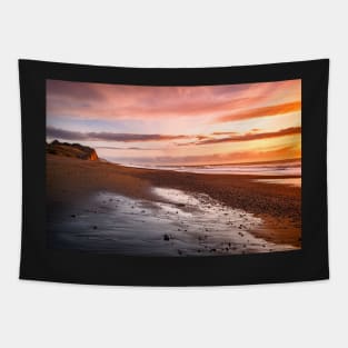 Sunset on a beach Tapestry