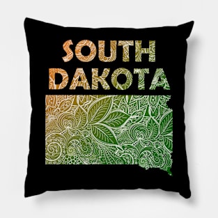 Colorful mandala art map of South Dakota with text in green and orange Pillow