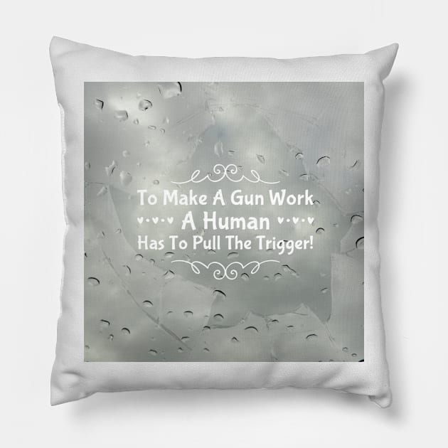 To make a gun work, a human has to pull the trigger! Pillow by CasualCorner