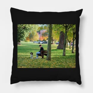 Young woman with her dog and phone in the park Pillow