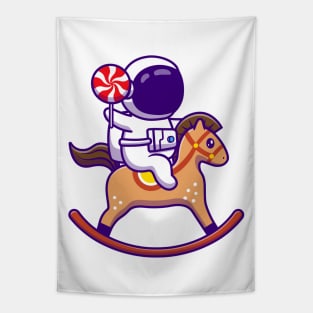 Cute Astronaut Playing Horse Toy And Holding Candy Tapestry