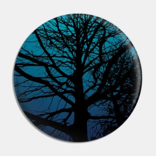 Tree silhouette on blue gradient background in the evening Pin