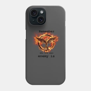 Catching fire: “Remember who the real enemy is” Phone Case