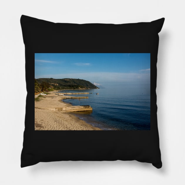 Beautiful coastline with mountains and rocks in Greece Pillow by NxtArt