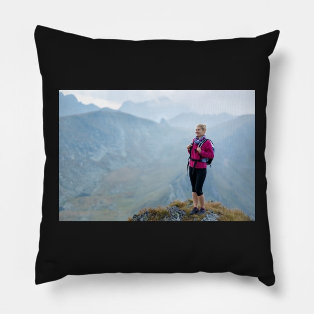 Woman backpacker hiking on a trail Pillow by naturalis