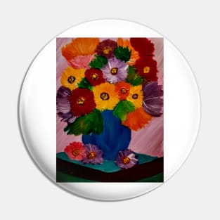 A lovely boutique of flowers in a blue vase Pin