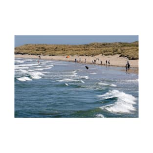 people on the beach at Bamburgh - Northumberland, UK T-Shirt