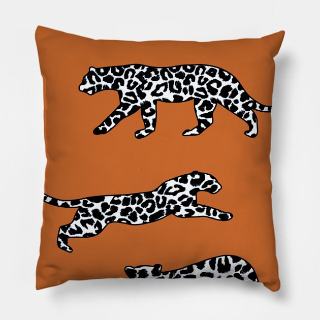 Leopard Shapes Pattern, Black and White, on Burnt Orange Pillow by OneThreeSix