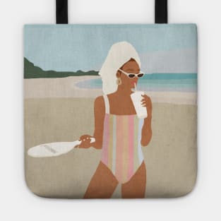 Beach girl in swimsuit Tote