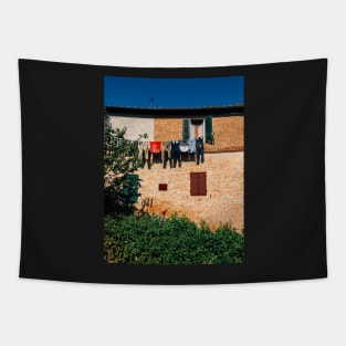 Laundry Drying on Washing Line Against Old Brick Building in Tuscany Italy Tapestry