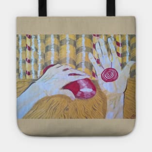 Female hand holds a jewelry. Tote