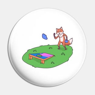 Fox playing cornhole Pin