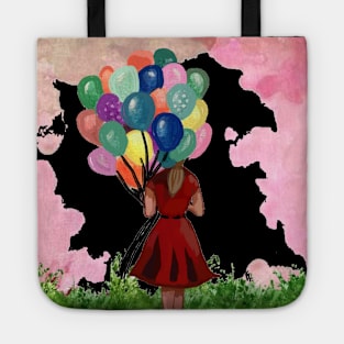 A girl holding balloons Tote