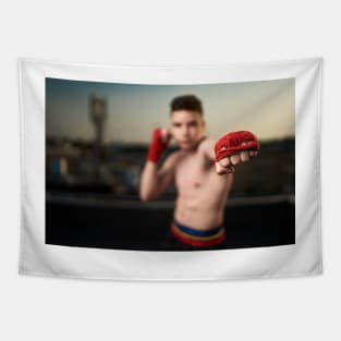 Kickbox fighter training in urban environment Tapestry