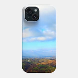 View from above on a hilly landscape under the blue sky with clouds Phone Case