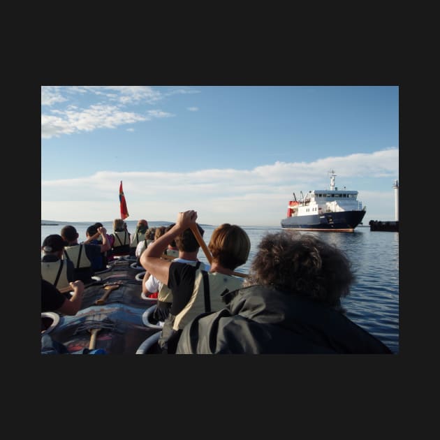 Paddling past the ferry by orcadia