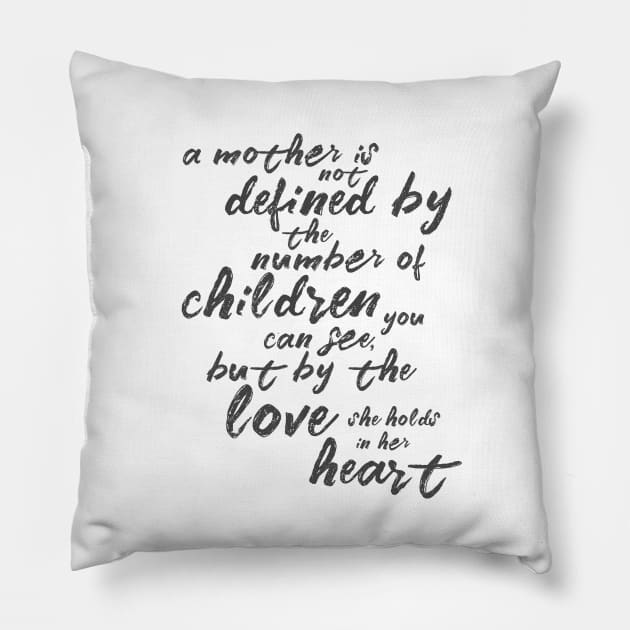 A mother is not defined by the number of children you can see... Pillow by crazycanonmom