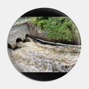 Stone Bridge Over a Flooding River in the Woods Pin