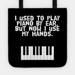 I used to play piano by ear, but now I use my hands. Tote