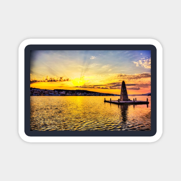 Obelisk at Drapano Bridge, and town of Argostoli behind, Kefalonia, Greece Magnet by tommysphotos