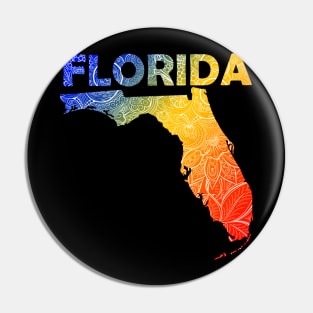 Colorful mandala art map of Florida with text in blue, yellow, and red Pin