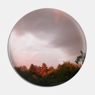 Natural color splendor of the sky before storm with red trees sun reflection Pin