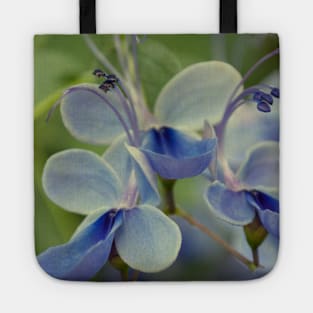 Unique Blue Flower with green leaves nature lovers beautiful photography design Tote