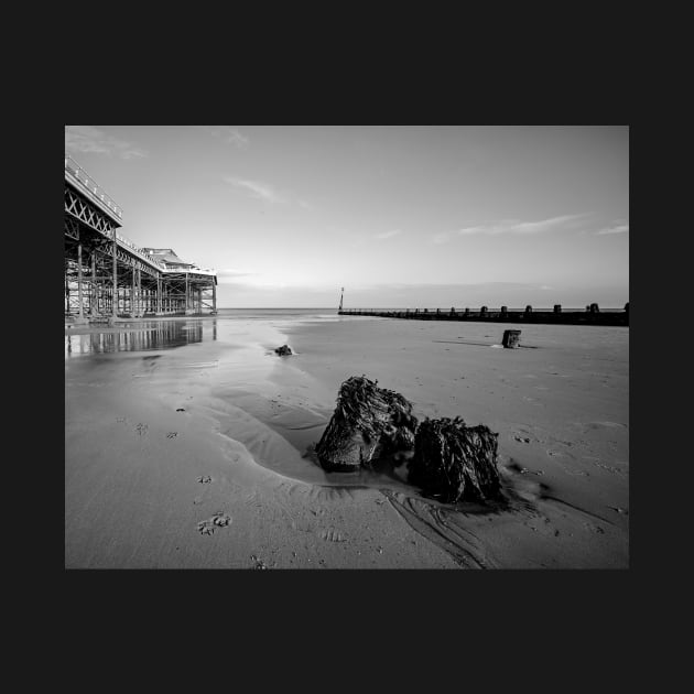 Pier and rocks on Cromer beach, Norfolk by yackers1