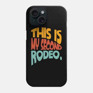 "This is my second rodeo." in plain white letters - cos you're not the noob, but barely Phone Case