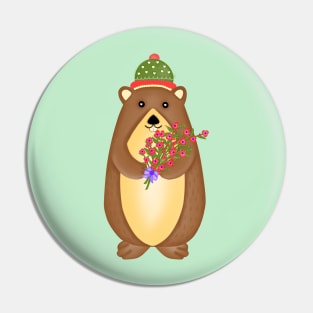 Cute groundhog with flowers bouquet. Pin