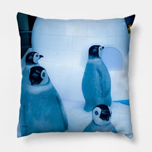 Igloo with a group of penguin sculptures Pillow