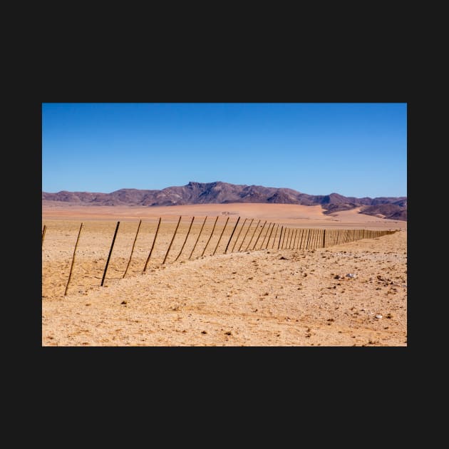 Fence across the desert. by sma1050